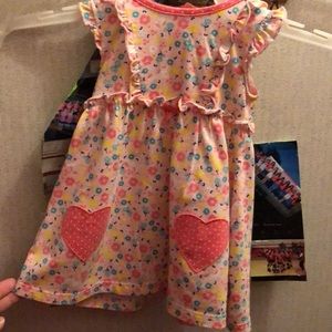 A pink flower printed with hearts